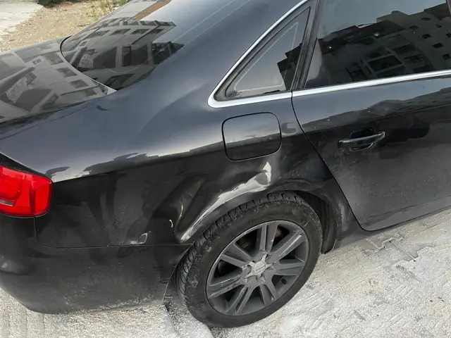 Audi A4 sol arka çamurluk göçüğü — Hatay boyasız göçük düzeltme öncesi